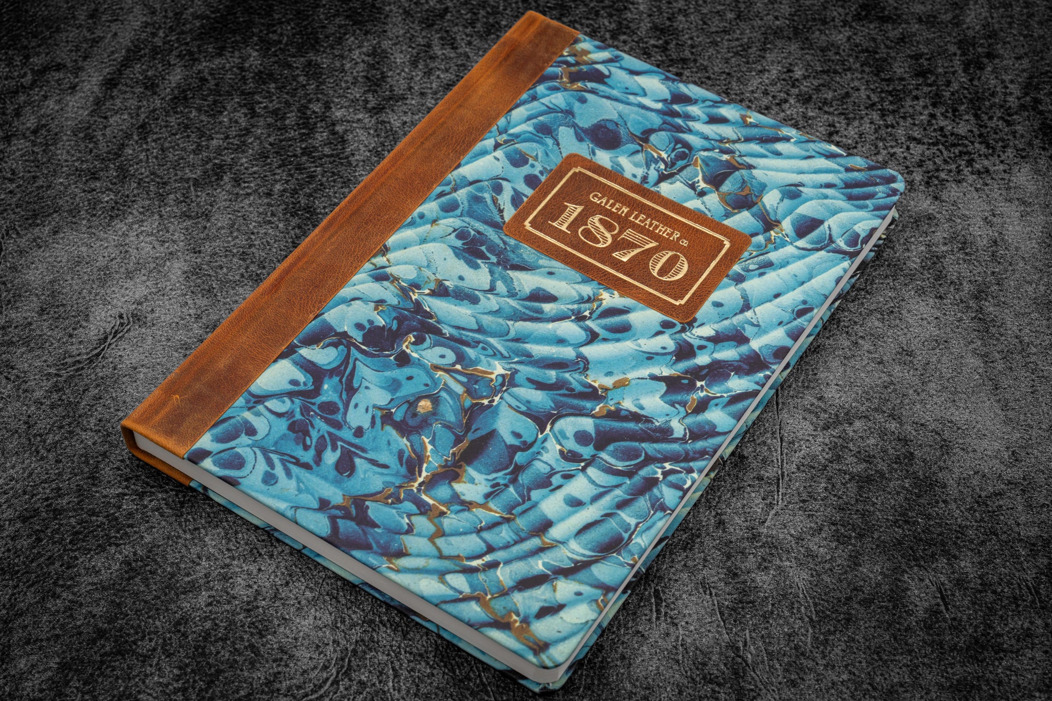 A hand-marbled autumn journal with cream pages