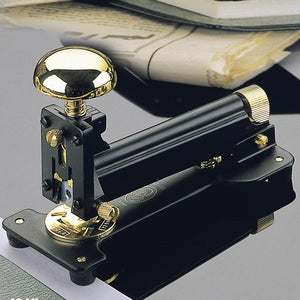 Gold and Black Stapler