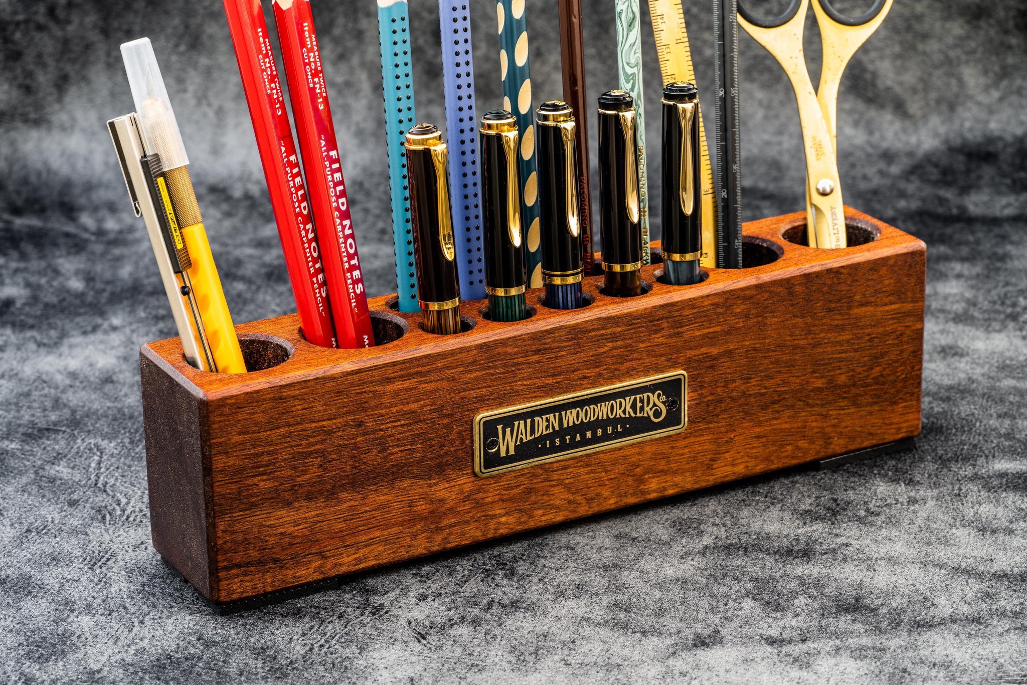 https://www.galenleather.com/cdn/shop/products/wood-desk-organizer-pen-and-tool-holder-mahogany-3_2048x.jpg?v=1560004078